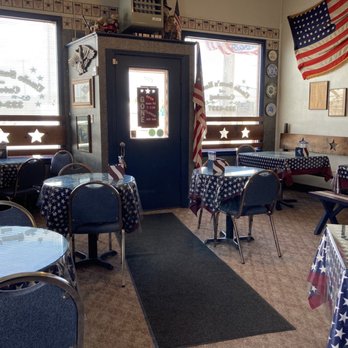 Uncle Sam's Eatery - tables and chairs with american flags on them - Delis Near Me - Columbus, Montana Uncle Sam's Eatery - tables and chairs with american flags on them - Delis Near Me - Columbus, Montana