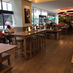 Vapiano - One part of dining room. Glass wall to garden patio
