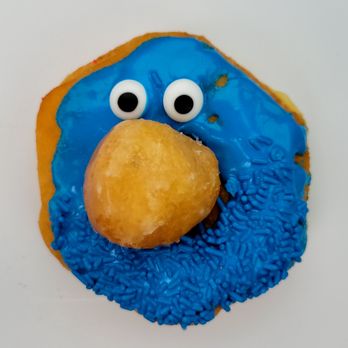 Texas Donuts - Character doughnut. Looks like Grover from Sesame Street. - Donuts Near Me - Lorton, Virginia Texas Donuts - Character doughnut. Looks like Grover from Sesame Street. - Donuts Near Me - Lorton, Virginia