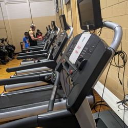 YMCA of the Sandhills - Fayetteville Branch - Children under 10 playing on treadmill with adult present who should know better.
