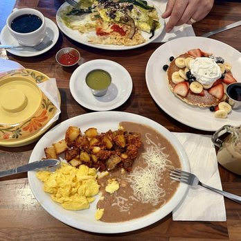 Cafe De Olla - Perfectly placed in front of me to devour. Veggie Omelette Veggie Omelette Side of Beans Side of Pancakes Chorizo Con Huevos - American Near Me - Burbank, California