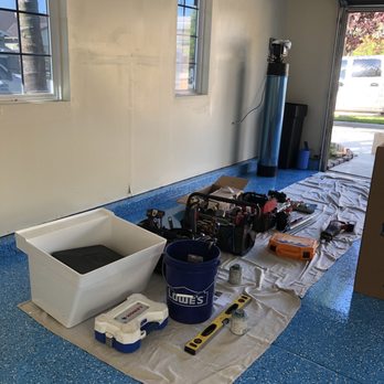Goode Plumbing - Drop cloth over garage floor, always a clean work area. - Plumbing Near Me - Clovis, California