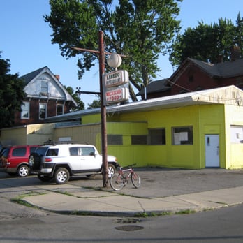 Laredo Mexican Restaurant & Deli - a bicycle parked in front of the building - Grocery Near Me - Fort Wayne, Indiana