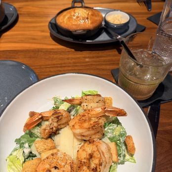 Flint Kitchen & Bar - Shrimp Caesar salad and Cast Iron Poblano Cornbread - New American Near Me - Oklahoma City, Oklahoma Flint Kitchen & Bar - Shrimp Caesar salad and Cast Iron Poblano Cornbread - New American Near Me - Oklahoma City, Oklahoma