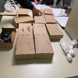 Person writing on the boxes needs better handwriting lol