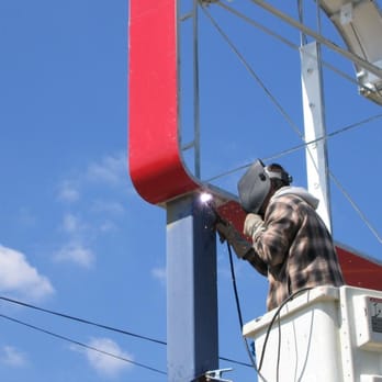 Vista Sign Services - Installing pole sign - welding - Signmaking Near Me - Cumming, Georgia Vista Sign Services - Installing pole sign - welding - Signmaking Near Me - Cumming, Georgia