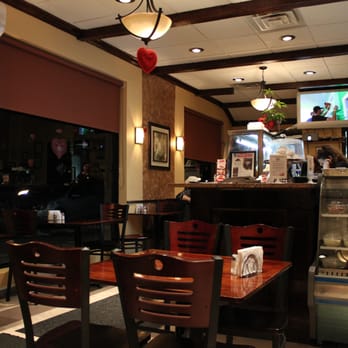Village Grill - the dining area of a restaurant - Greek Near Me - Forest Hills, New York