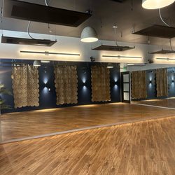 Santosha Studios Yoga & Wellness - A serene, upscale space where you'll feel tropical vibes paired with chic, modern accents.  You'll start to relax immediately.