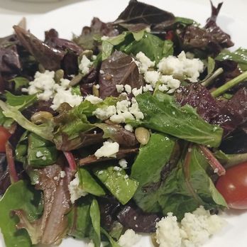 PIER 22 - Pier 22 House Salad with mixed field greens, balsamic vinaigrette, roasted pumpkin seeds, Gorgonzola and grape tomatoes. - New American Near Me - Bradenton, Florida PIER 22 - Pier 22 House Salad with mixed field greens, balsamic vinaigrette, roasted pumpkin seeds, Gorgonzola and grape tomatoes. - New American Near Me - Bradenton, Florida