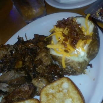 Texas Roadhouse - Pulled pork with loaded baked potato and corn. - American Near Me - Boynton Beach, Florida