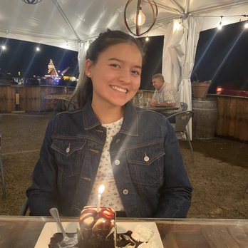 1850 Restaurant - Chocolate cake and smiling daughter. - American Near Me - Mariposa, California