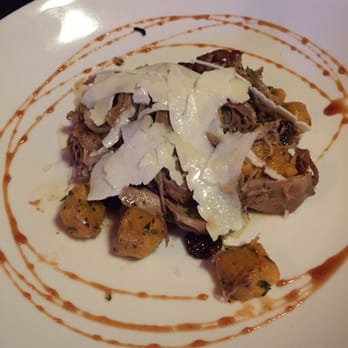 Flat Iron Grill - Duck Gnocchi. Confit duck, butternut squash gnocchi, shallot, tart cherries & pecorino-Romano. - Steakhouses Near Me - Issaquah, Washington Flat Iron Grill - Duck Gnocchi. Confit duck, butternut squash gnocchi, shallot, tart cherries & pecorino-Romano. - Steakhouses Near Me - Issaquah, Washington
