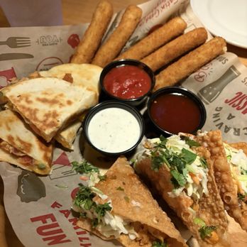 Applebee's Grill + Bar - Sampler with mozzarella sticks, chicken quesadilla, and wonton chicken tacos - American Near Me - Gilroy, California Applebee's Grill + Bar - Sampler with mozzarella sticks, chicken quesadilla, and wonton chicken tacos - American Near Me - Gilroy, California