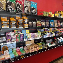 Red Star Vapor & Smoke - RYO Tobacco, RAW rolling Papers, Swisher Sweets, Backwoods, and more.