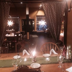 Margaux's Table and Farm Store - The inside of the restaurant, lit up at night.