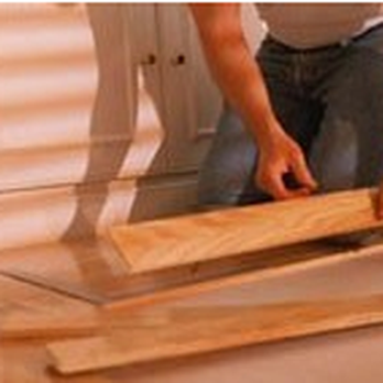 Vinroe Carpet & Flooring - a man working on a hardwood floor - Carpet Installation Near Me - Butler, Pennsylvania Vinroe Carpet & Flooring - a man working on a hardwood floor - Carpet Installation Near Me - Butler, Pennsylvania