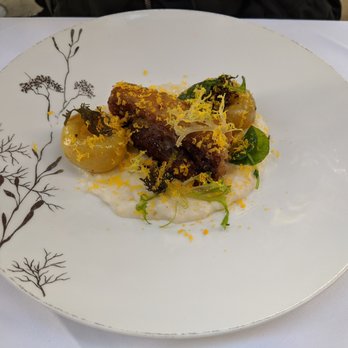 Spruce - Crispy Pork Belly - Anson Mills grits, cured egg yolk, pickled apple - American Near Me - San Francisco, California