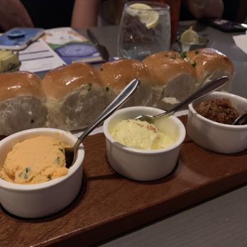 Ale & Compass Restaurant - Bread Service with pub cheese, onion jam and citrus butter. - American Near Me - Orlando, Florida Ale & Compass Restaurant - Bread Service with pub cheese, onion jam and citrus butter. - American Near Me - Orlando, Florida