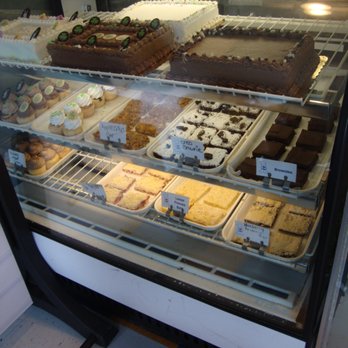 Blue Egg Bakery - Display case on the left with cakes, brownies, & bars. - Bakeries Near Me - Elk River, Minnesota Blue Egg Bakery - Display case on the left with cakes, brownies, & bars. - Bakeries Near Me - Elk River, Minnesota