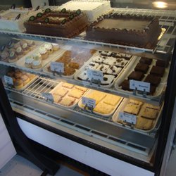 Blue Egg Bakery - Display case on the left with cakes, brownies, & bars.