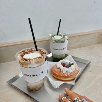 Memorylook - The Einspanner Latte (left), Matcha Einspanner (right), strawberry milk cream doughnut, and my tasty hand - Coffee & Tea Near Me - Los Angeles, California Memorylook - The Einspanner Latte (left), Matcha Einspanner (right), strawberry milk cream doughnut, and my tasty hand - Coffee & Tea Near Me - Los Angeles, California