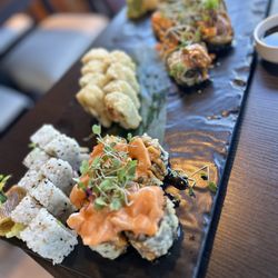 Taku Sushi - Philadelphia Roll (customized), Los Angeles roll. I can't reminder the order rolls unfortunately