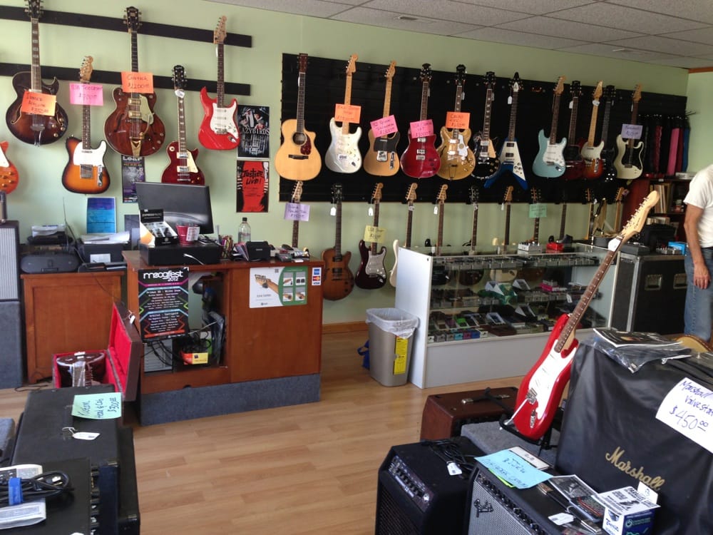 THE GUITAR TRADER Updated September 2024 732 Haywood Rd, Asheville, North Carolina Musical