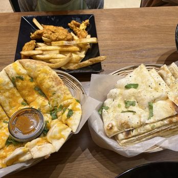 Tarka Indian Kitchen - Wender Plaza - Cheese Naan, Garlic Naan, Kid's chicken meal w/fries - Indian Near Me - San Antonio, Texas Tarka Indian Kitchen - Wender Plaza - Cheese Naan, Garlic Naan, Kid's chicken meal w/fries - Indian Near Me - San Antonio, Texas