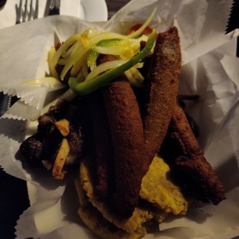 Gou Restaurant - Fritay platter: which is a mixture of fried foods. This is fried goat, fried plantains and fried akra ( fritters made of malanga) - Haitian Near Me - Philadelphia, Pennsylvania