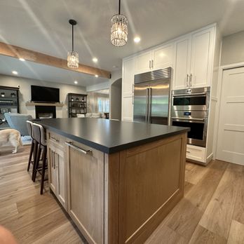 Creative Design & Build - built in dishwasher on island (foreground); Wolf / Sub-zero appliances. Pendant lights from Pottery Barn - General Contractors Near Me - San Diego, California Creative Design & Build - built in dishwasher on island (foreground); Wolf / Sub-zero appliances. Pendant lights from Pottery Barn - General Contractors Near Me - San Diego, California