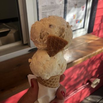 Novel Ice Cream - butter pecan on top with Madagascar vanilla on a gluten-free cone - Desserts Near Me - Phoenix, Arizona