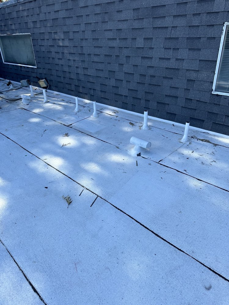 Slide of Apex Roofing & Construction