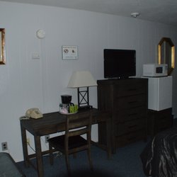 Amenities: Flat TV, Fridge, Coffee Maker, Telephone, Work Desk, Microwave