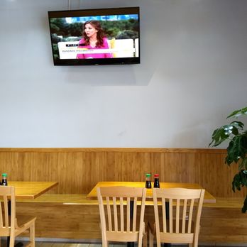 Umami - If you like extended bench seating.  Unobtrusive television, we hardly knew it was present because it was on mute. - Sushi Bars Near Me - Suwanee, Georgia