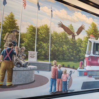 Firehouse Subs - a painting of a fire truck and a fireman - Sandwiches Near Me - Boise, Idaho