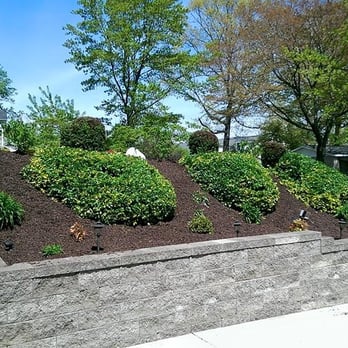 Lego Services - a pile of mulch in front of a house - Landscaping Near Me - Altoona, Pennsylvania Lego Services - a pile of mulch in front of a house - Landscaping Near Me - Altoona, Pennsylvania