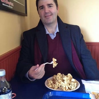 Marc's Fried Clams - a man sitting at a table with a plate of food - Seafood Near Me - Moncton, New Brunswick Marc's Fried Clams - a man sitting at a table with a plate of food - Seafood Near Me - Moncton, New Brunswick