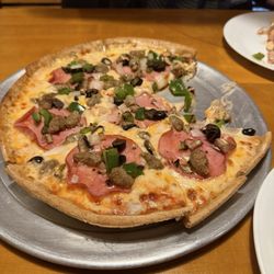 Bear Pie - canadian bacon, italian sausage, mushrooms, onions, green peppers & black olives