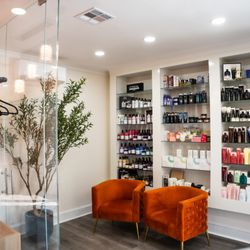 Salon 210 - LOUNGE; Sit & relax while you wait for your professional to come get you! You can store bags and coats + amazing high end products for sale!