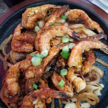 Tampico Mar Y Tierra - 12 grilled shrimp served with fried rice. - Seafood Near Me - Houston, Texas Tampico Mar Y Tierra - 12 grilled shrimp served with fried rice. - Seafood Near Me - Houston, Texas