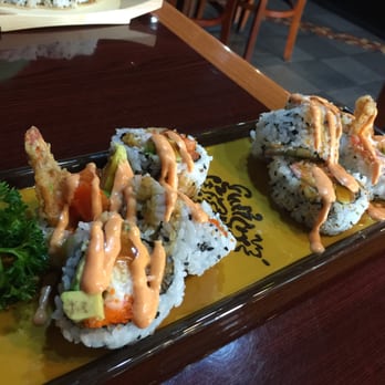 Sushi97 - a plate of sushi with sauce on it - Sushi Bars Near Me - Prince George, British Columbia