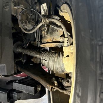 Mr. Tire Auto Service Centers - They replaced the CV axil. This is 1 week later with the boot torn and debris in the grease. - Tires Near Me - Waynesville, North Carolina Mr. Tire Auto Service Centers - They replaced the CV axil. This is 1 week later with the boot torn and debris in the grease. - Tires Near Me - Waynesville, North Carolina