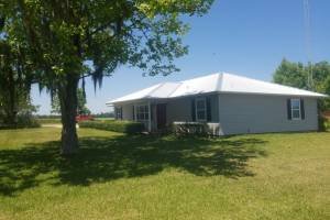 Slide of Elsa Roofing Company