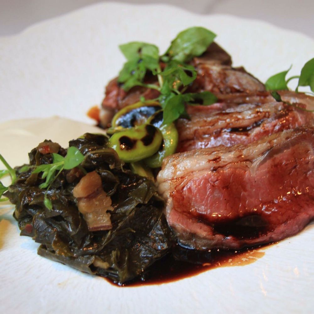 the Albert - Rack of Lamb with black garlic au jus, collard greens and fava beans. - New American Near Me - Chicago, Illinois the Albert - Rack of Lamb with black garlic au jus, collard greens and fava beans. - New American Near Me - Chicago, Illinois