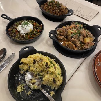 Petiscos - Top top bottom: duck rice, linguiça (left middle), pork and clams, and bacalhau. - Portuguese Near Me - San Jose, California Petiscos - Top top bottom: duck rice, linguiça (left middle), pork and clams, and bacalhau. - Portuguese Near Me - San Jose, California
