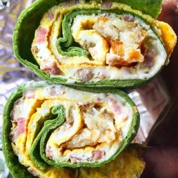 The Hen House. 4 eggs sausage pork roll cheese and hash brown on a spinach wrap The Hen House. 4 eggs sausage pork roll cheese and hash brown on a spinach wrap
