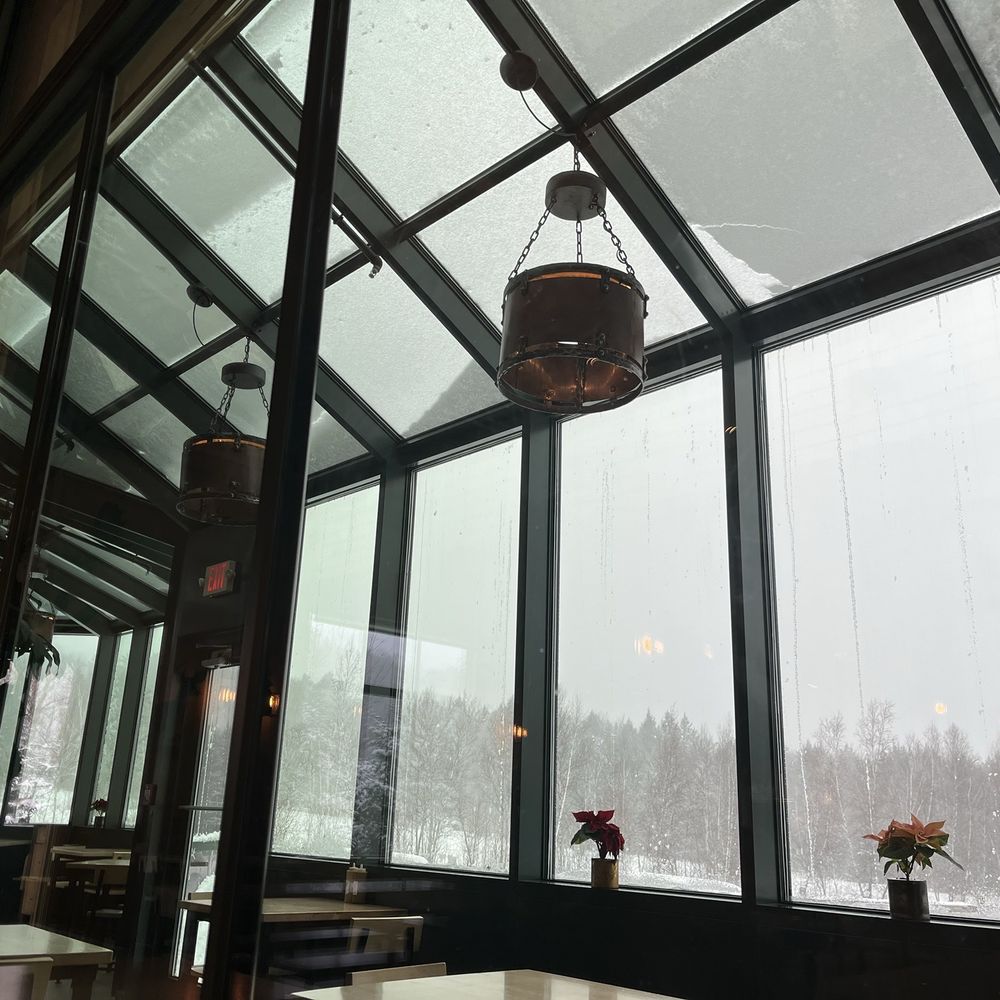 Von Trapp Brewing Bierhall Restaurant - View of "greenhouse" dining area from inside the restaurant - Austrian Near Me - Stowe, Vermont