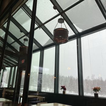 Von Trapp Brewing Bierhall Restaurant - View of "greenhouse" dining area from inside the restaurant - Austrian Near Me - Stowe, Vermont