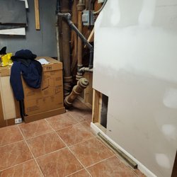 Waypoint Home Improvement - New drywall ans new tile floor in Laundry room.