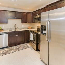 Capital Community Investments - Appliance and cabinet install